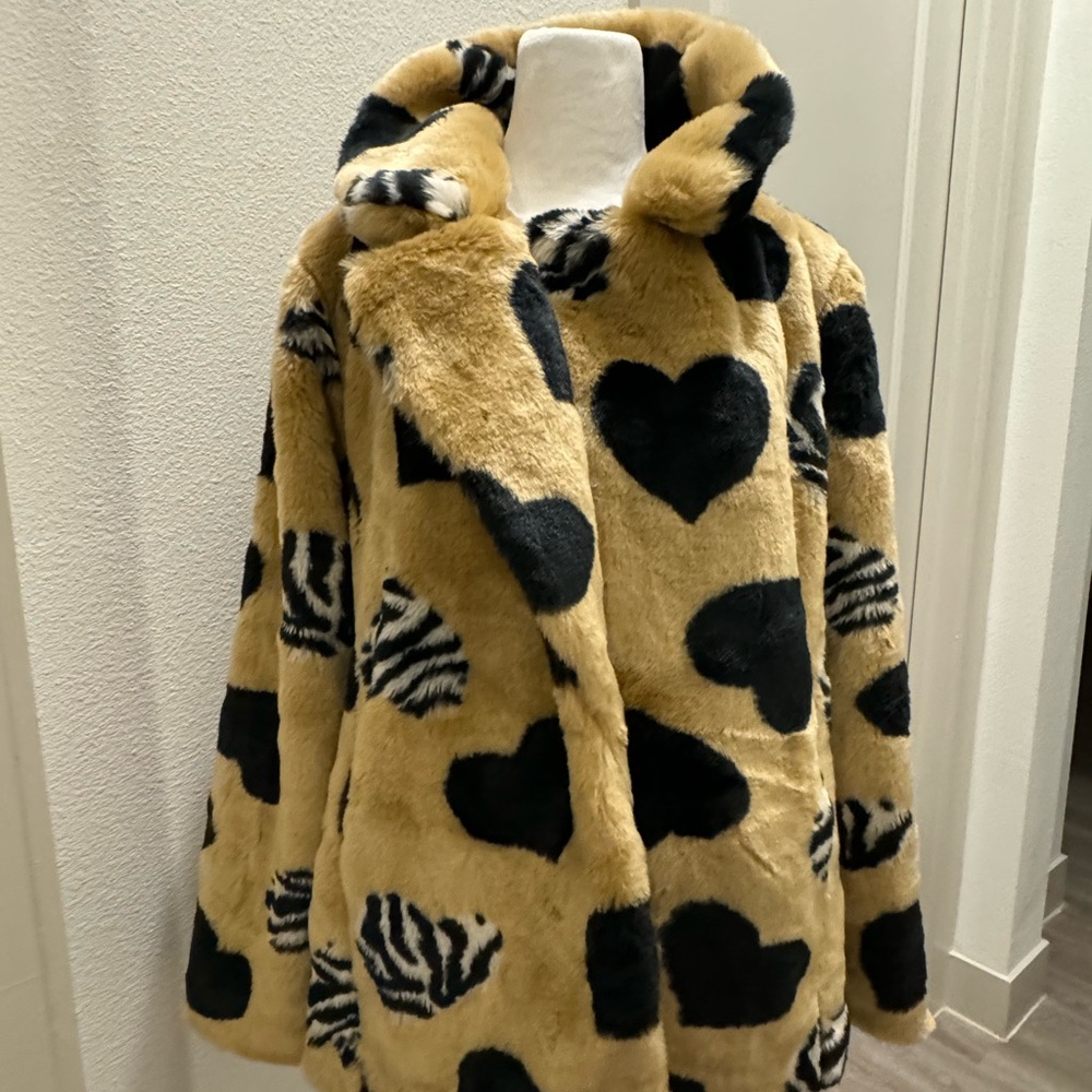 woman’s coat from Anthropologie, faux fur